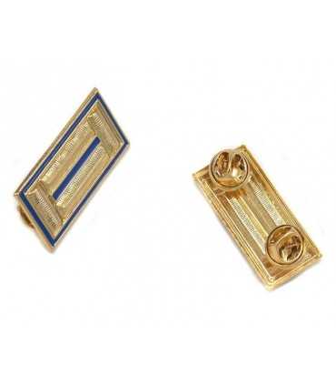 Metal shield for blue shirt