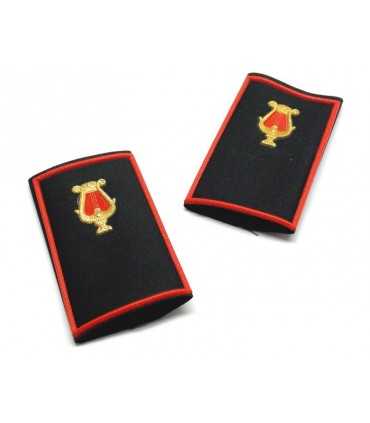 Tubular black musical band with golden zither and red border