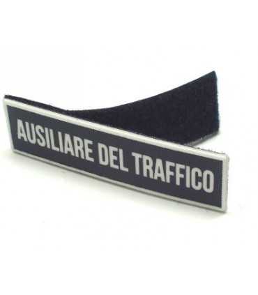 Scritta Ausiliari del traffico plastificata con velcro in materiale plastificato
